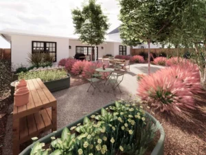 Bistro area featuring tables and lush greenery