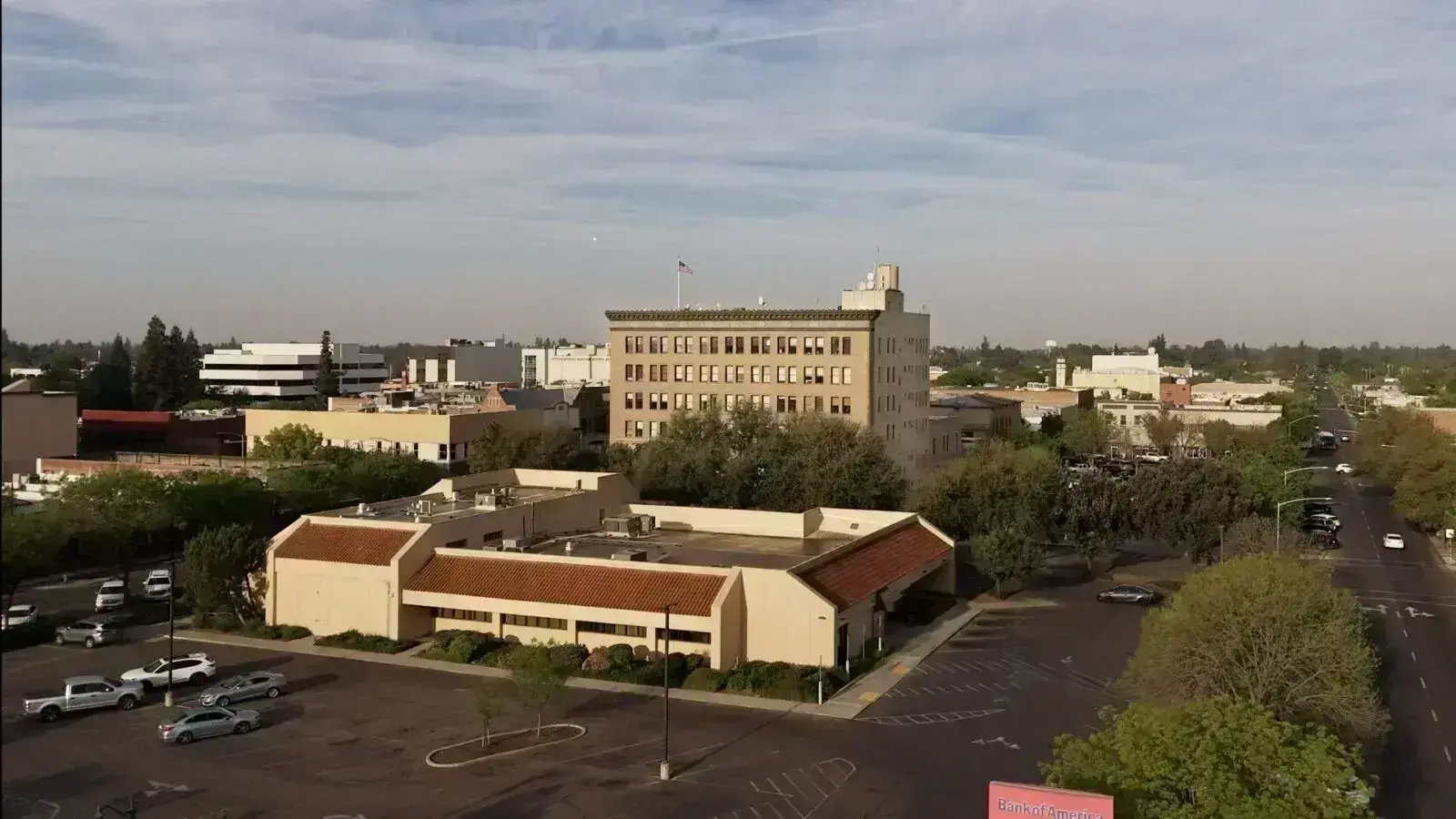 Aerial view of a downtown area with buildings and trees